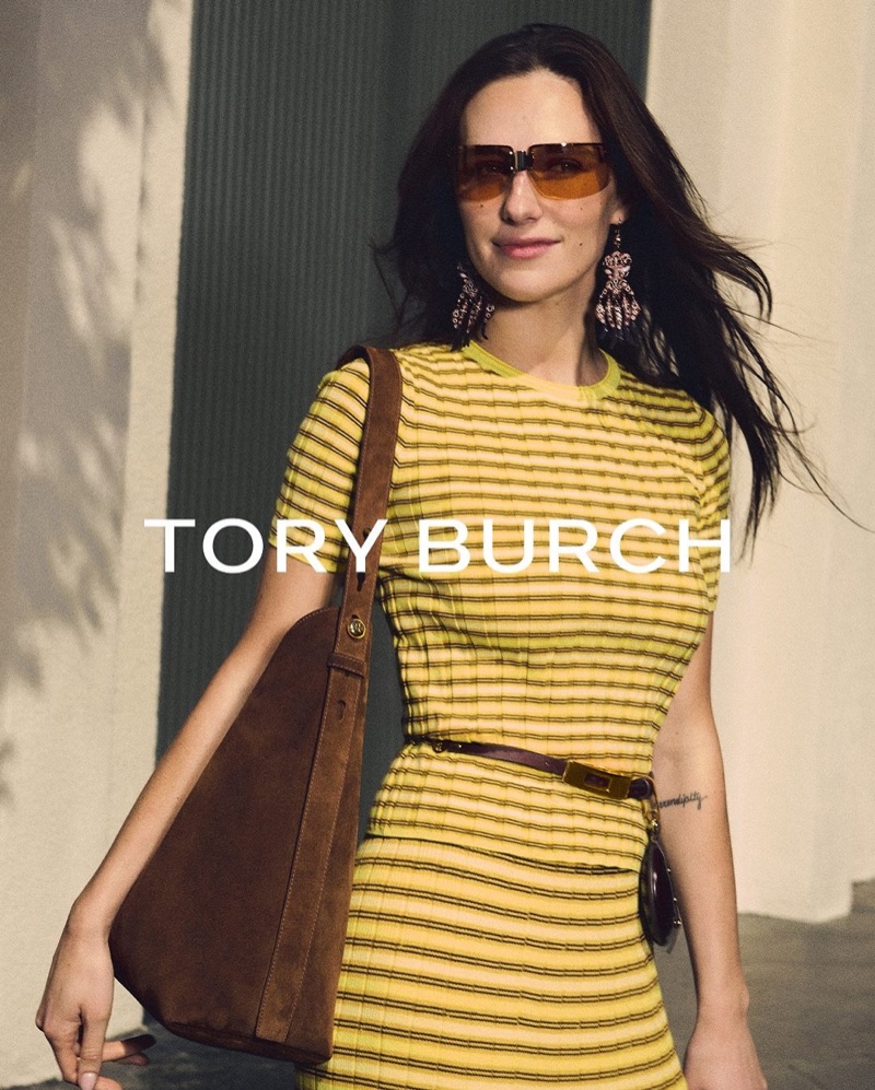 Devon Lee Carlson poses in Tory Burch's summer 2025 collection.
