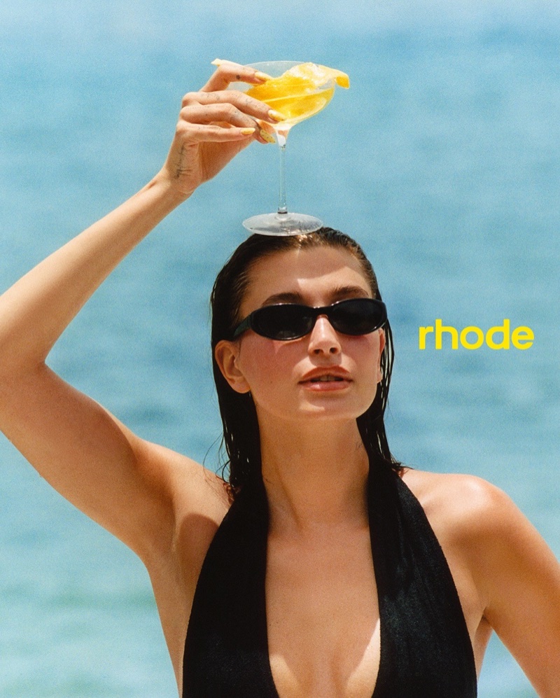 Hailey Bieber poses for Rhode's Lemontini Peptide Lip Tint