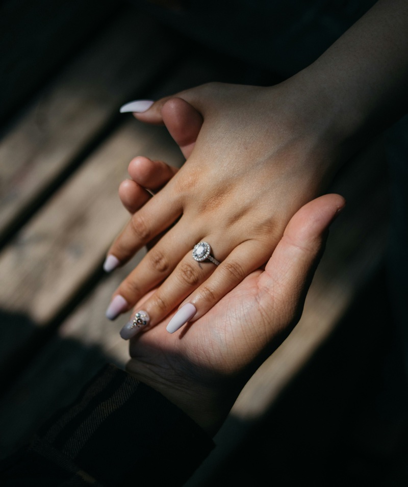 Holding Hands Engagement Ring