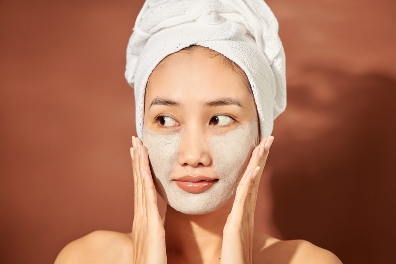 Clay mask asian woman